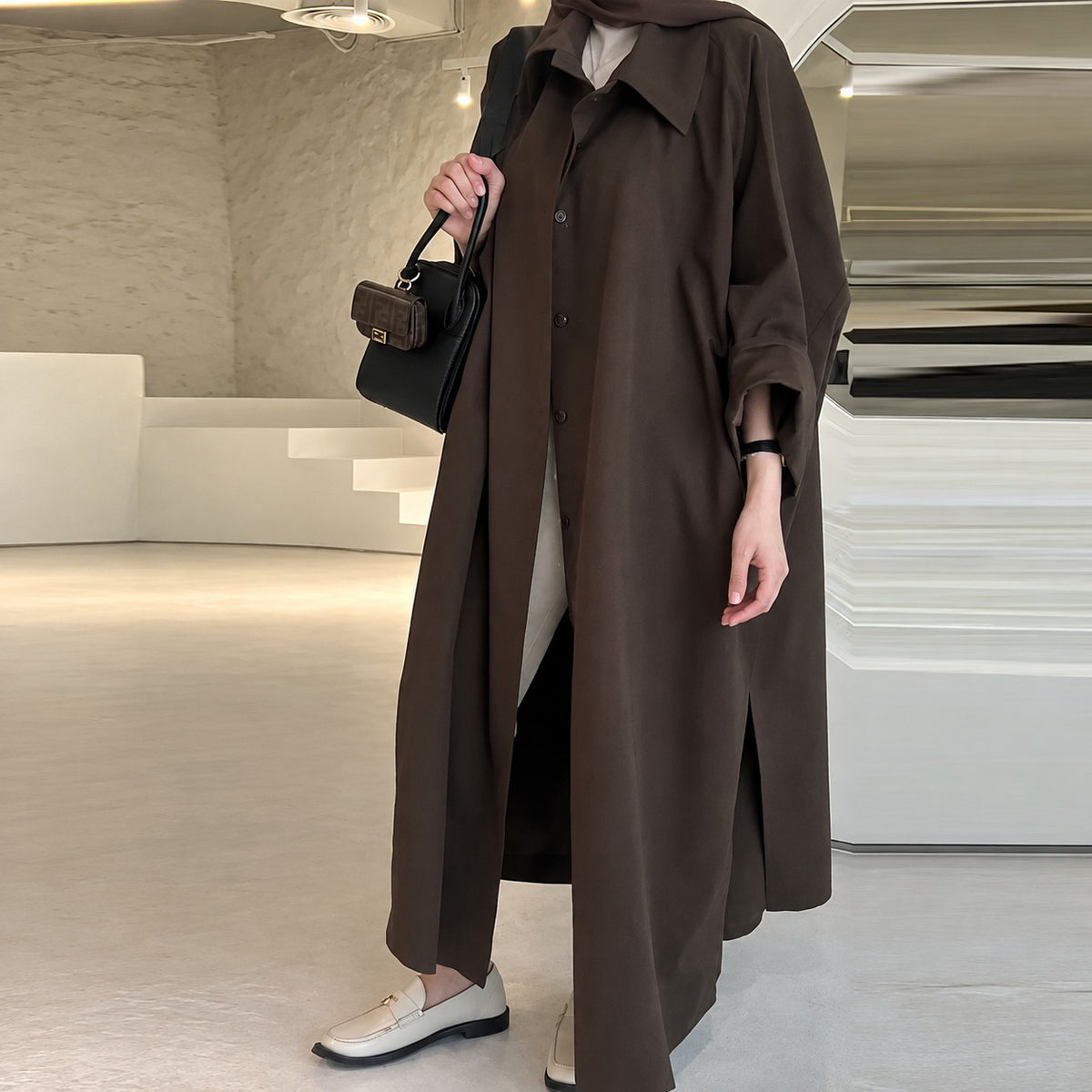 Manteau long femme coupe oversize fermeture à boutons poches latérales