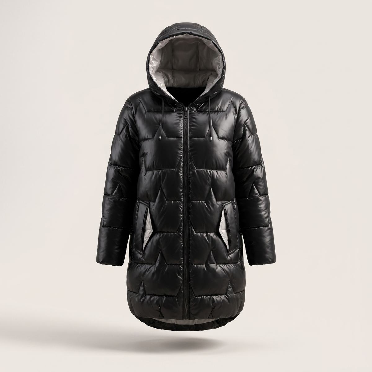 Manteau matelassé pour femmes à capuche longline avec fermeture éclair et coupe élégante
