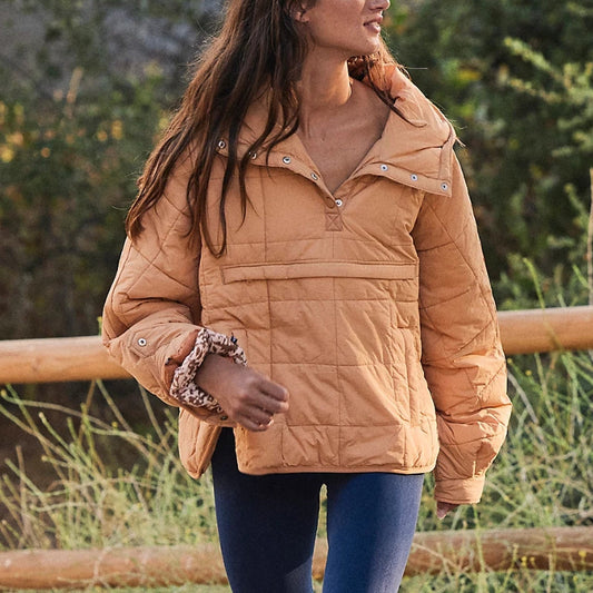 Veste puffer femme à capuche boutonnée design léger matelassé